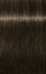 Nuanță de păr brun închis cu reflexii reci și textură naturală, ideală pentru o colorare profundă și elegantă